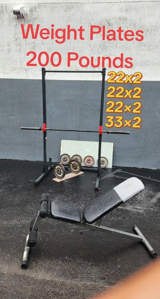 $250. Weight Plates 23²+23²+23²+33³ :198 POUNDS + BAR+ BENCH + Rack / PULL Ups + J Hooks.DeliveryFee