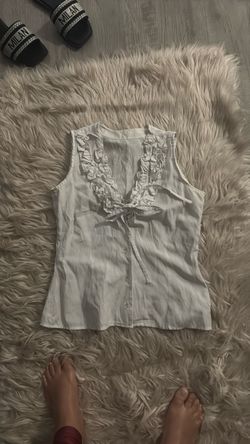 White Sleeveless Ruffle Button-Up Blouse