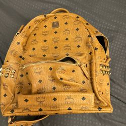 MCM Stark Side Studs Backpack in Visetos Cognac Leather brown 