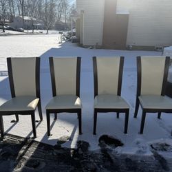 Round Glass Dining Table + 4 Chairs — $250