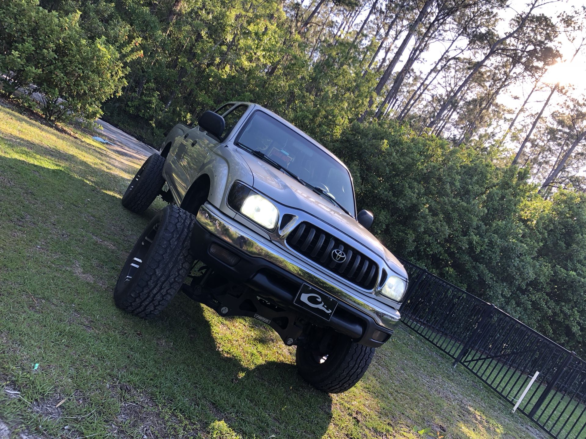 $10,000 obo 2003 Toyota Tacoma 4 door TWO WHEEL DRIVE 156,500 miles 6in fabtech lift 2 inch wheel spacers 285/55 R18 Gear wheels on Falken wildpeak