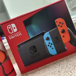 Nintendo Switch with Neon Blue and Neon Red Joy-Con