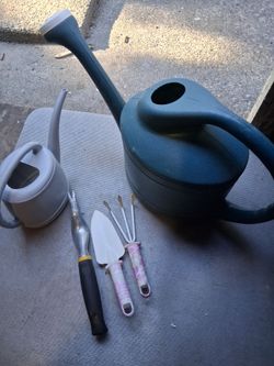 2 Watering can and 3 garden tools