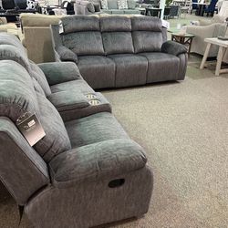 Brand New Reclining Sofa And Loveseat With Speaker Console