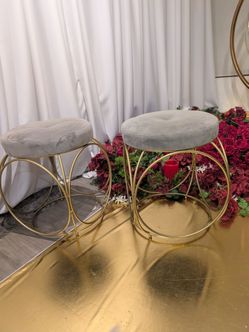 Two beautiful  grey round stools