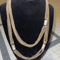 Nicole By Nicole Miller gold tone multi stranded crystal/rhinestone chain necklace 