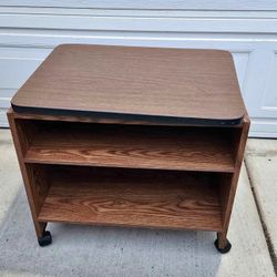 Rolling table with rotating table top