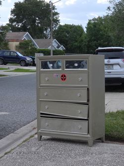 Tall dresser free by the road