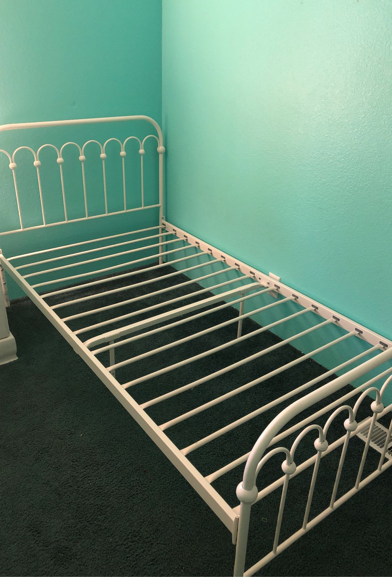 2 Matching white metal twin bed frames.