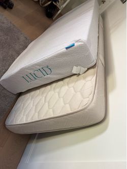 Two clean twin mattresses