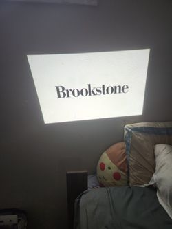Brookstone  Mini Projector 