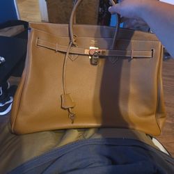 Brown Bag In Good Condition And Paperwork Send Offers!