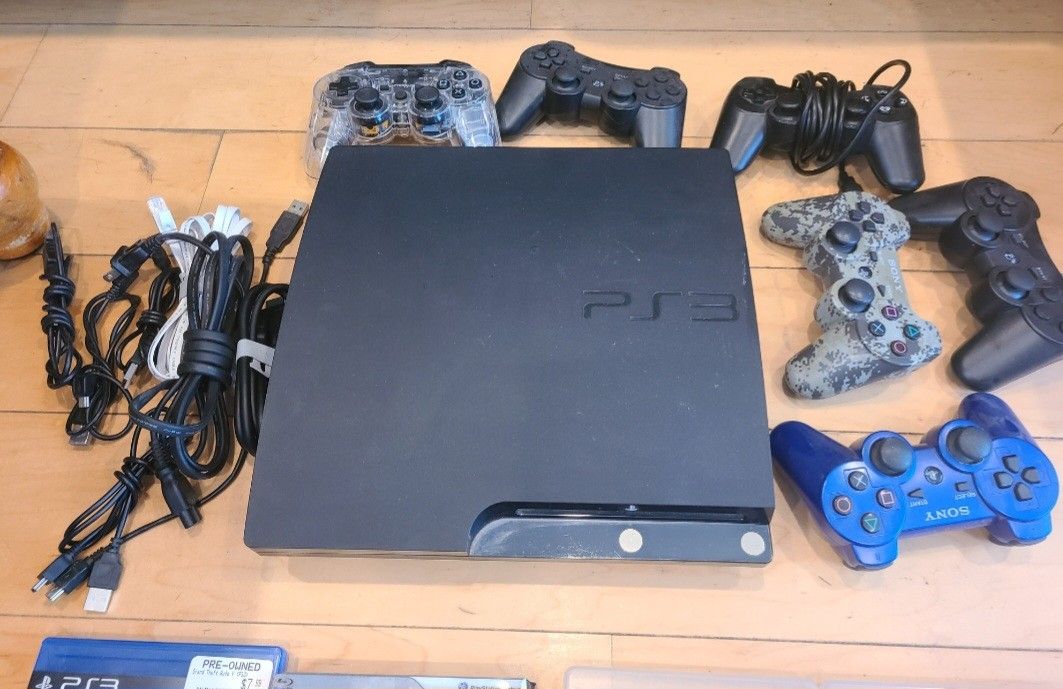 PS3 With 17 Games 5 Controlers