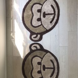 2 monkey bath mats. So cute! Easy to wash, and are super durable. One has an imperfection, which is shown in a close up. Not very noticeable at all i