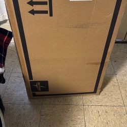 Drop Arm Commode With Padded Seat 