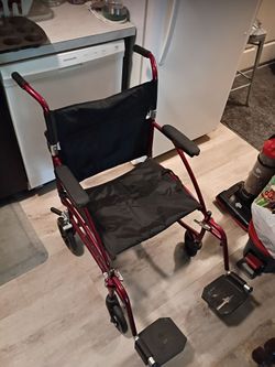 Transport wheelchair