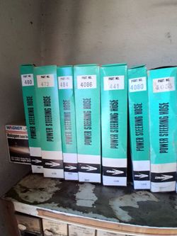 NOS Omega power steering hoses.