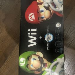 *black Mariokart wii 32GB storage with accessories*(brand new never took out of box )