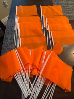 Over 30 small orange flags