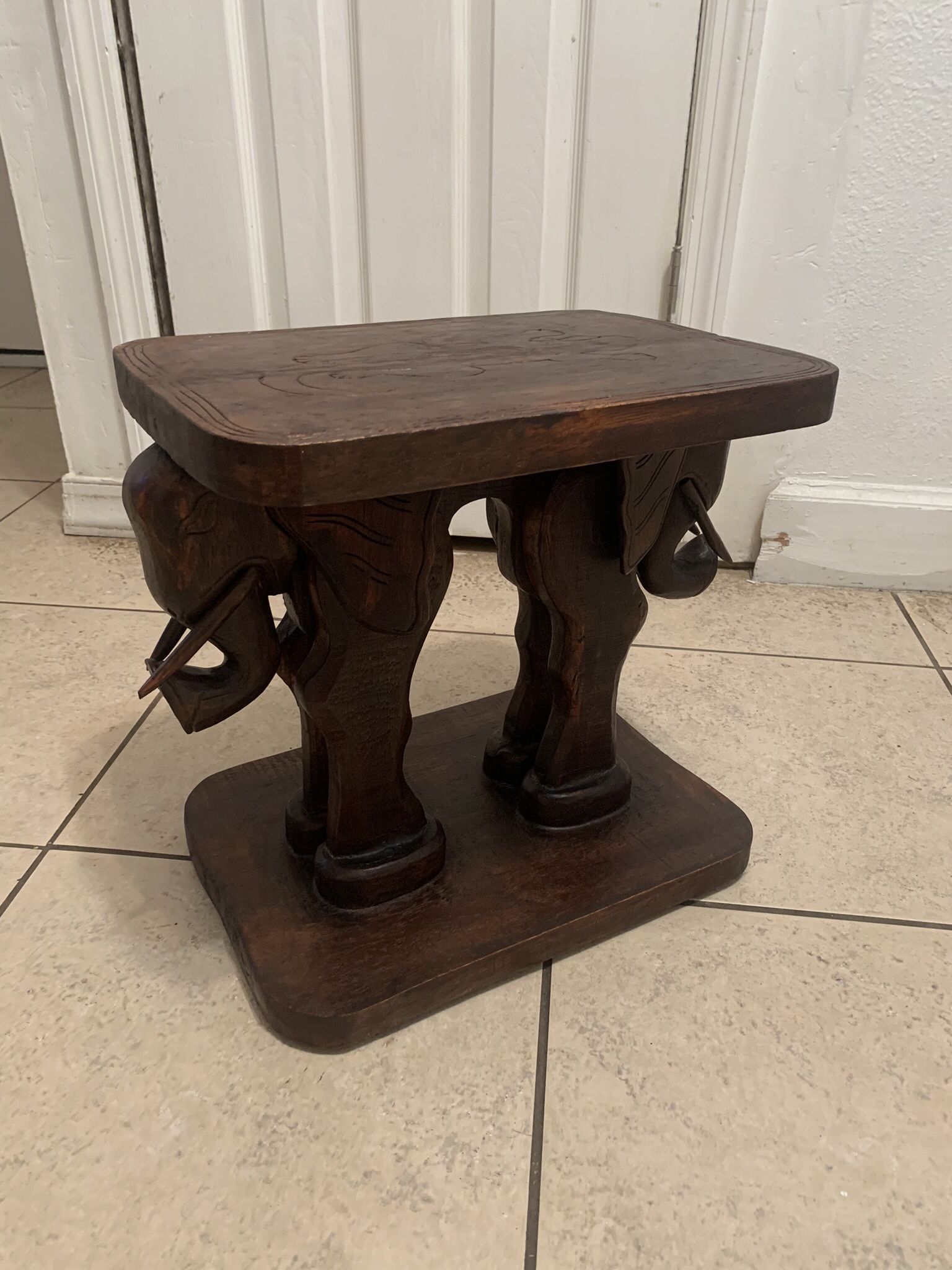 Antique hand carved elephant table