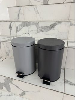 2 small trash cans