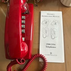 Cortelco Red Telephone with Manual Cortelco 2500/2554 model with instruction manual.