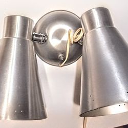 Authentic midcentury modern spun aluminum wall sconce reading lamps.