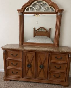 Queen size bedroom set includes a nightstand and large dresser with mirror