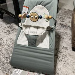 BabyBjorn Bouncer with wooden toy attachment !! Used 1 Time!!