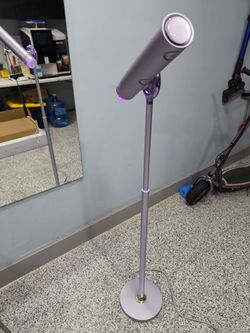 Standing hair dryer with remote control
