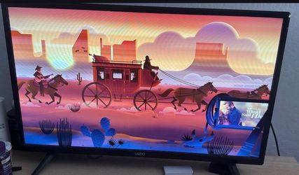 Vizio Flat Screen TV -32 inches comes with remote.