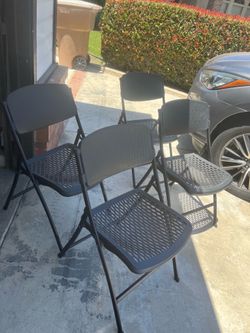 4  foldable chairs