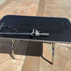 Dog grooming table