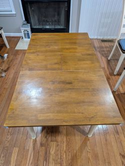 Butterfly Hidden Leaf Dining Table