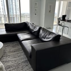 Brown leather sofa (L Shape) $1000