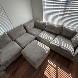 Grey sectional & ottoman