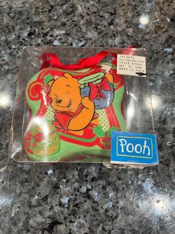 Vintage Winnie The Pooh Christmas holiday ornament figurine. Size approximately 3 inches long by 3 inches wide. Brand new in original packaging. The