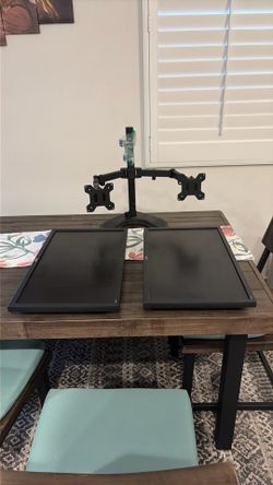 two monitors plus the stand