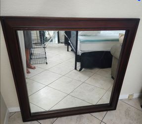 Hanging wall mirror 48 in by 48 in with a 4-in Wood Frame  Only $37.50 - Firm