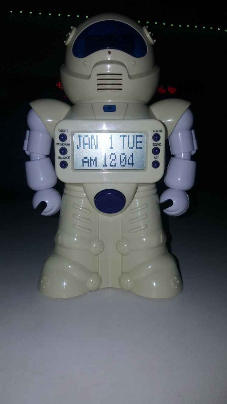 Robot toy bank/alarm clock