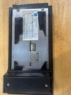 Manual Credit Card Imprinter, constructed of plastic and metal