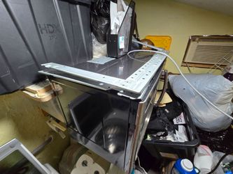 GE PROFILE OVER THE RANGE MICROWAVE
