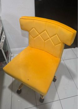 yellow rolling chair