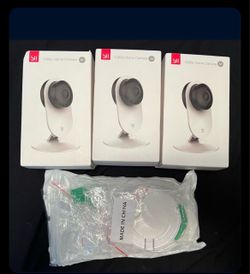3 cameras YI and wall mounts