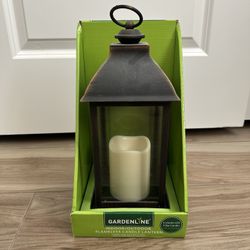 Lantern with flameless pillar candle