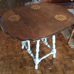 Antique table refurbished with drop down sides