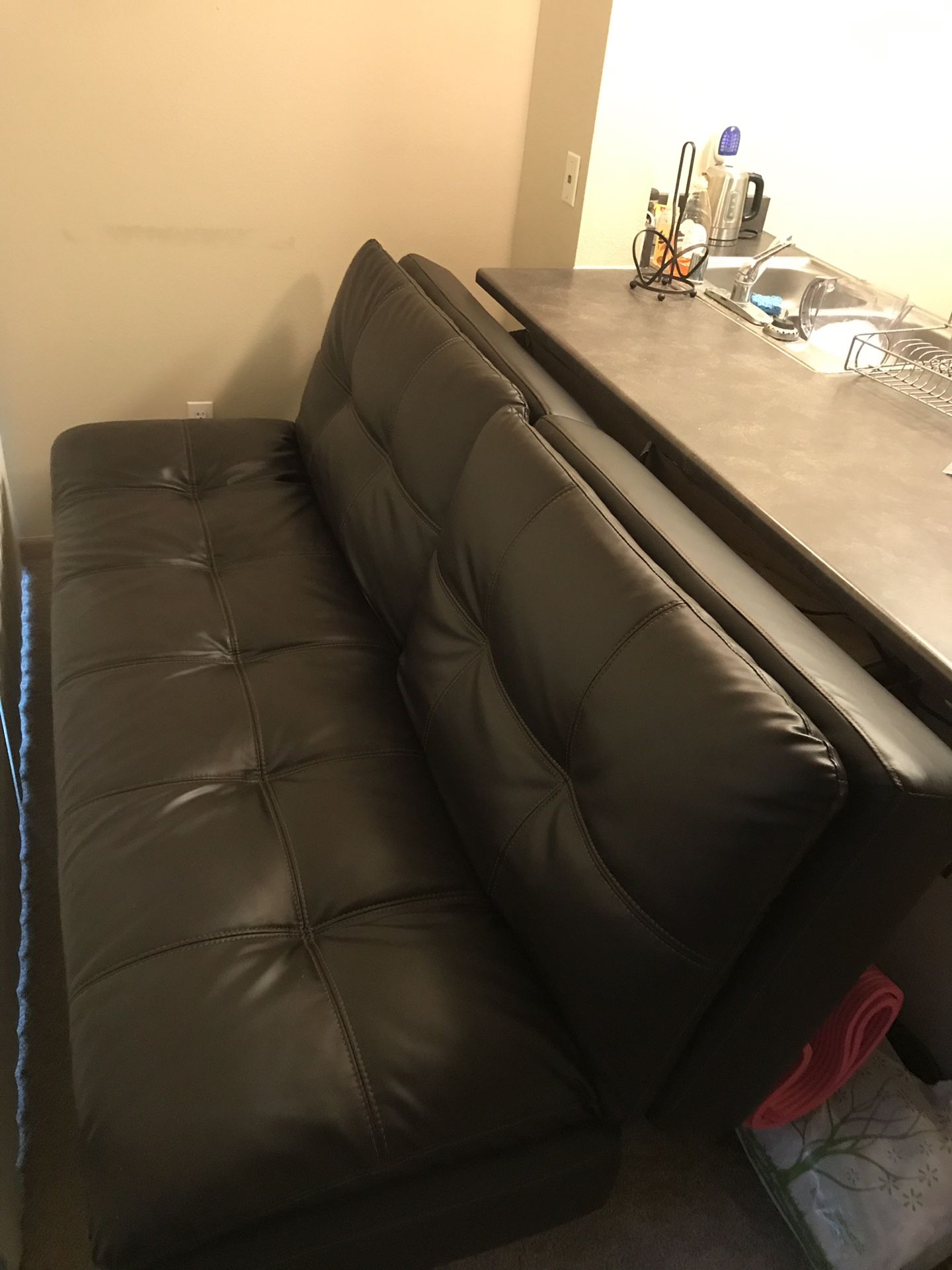 Leather sofa bed/ futon