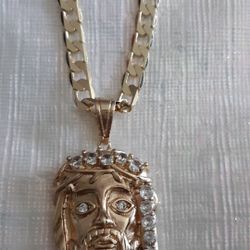 Cuban chain in Gold plate with the image of Jesus with zirconia