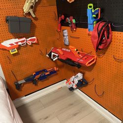 Nerf Wall and 16 + Nerf Guns And Accessories