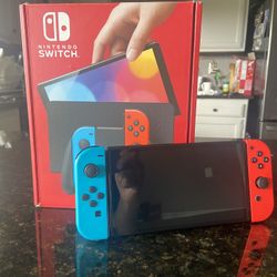 Nintendo Switch OLED Like New (Trade For Older Video Games)